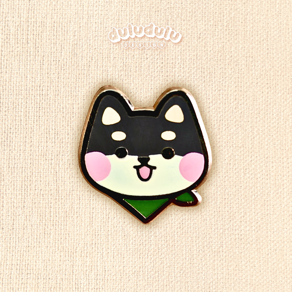 black shiba inu mini pin on a plain background