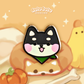 black shiba inu mini pin on an illustrated background 