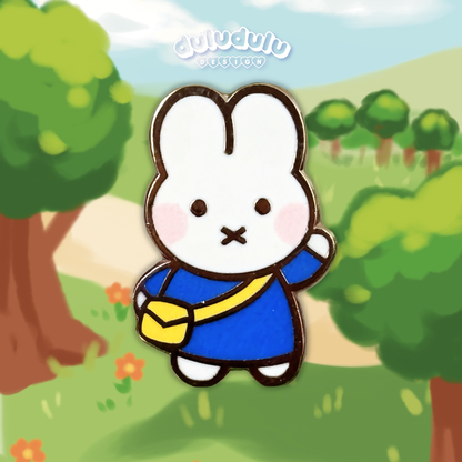 mini blue miffy pin on an illustrated cartoon background