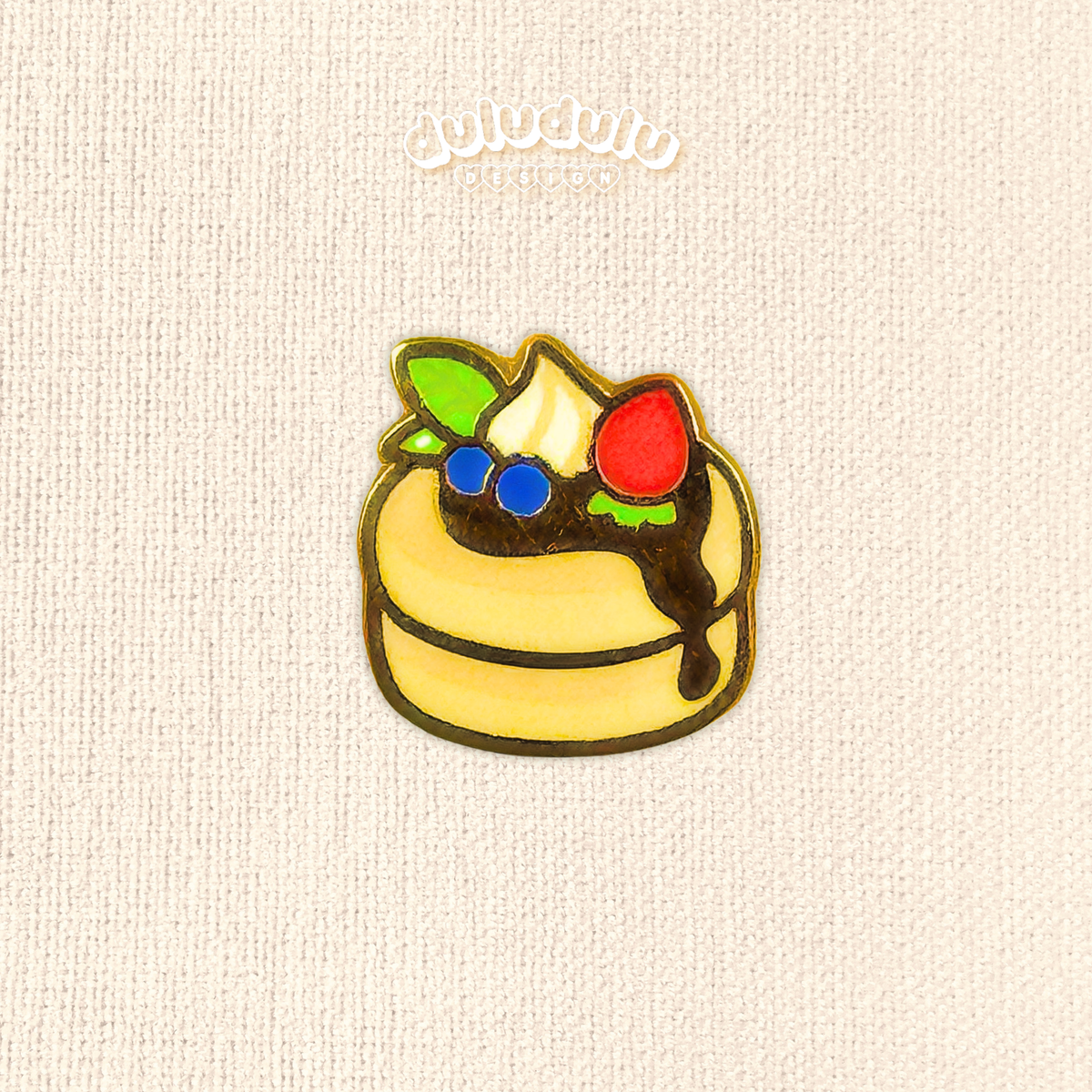 pancake mini pin on a plain background