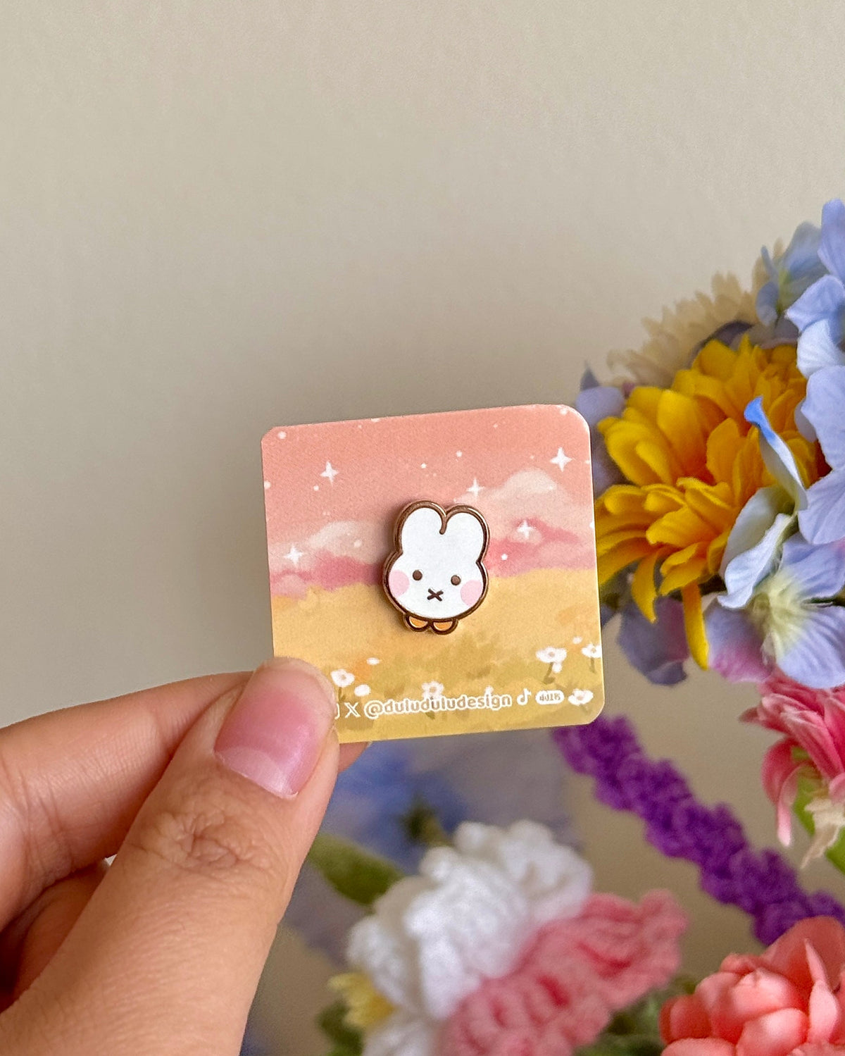 hand holding miffy bunny tiny pin