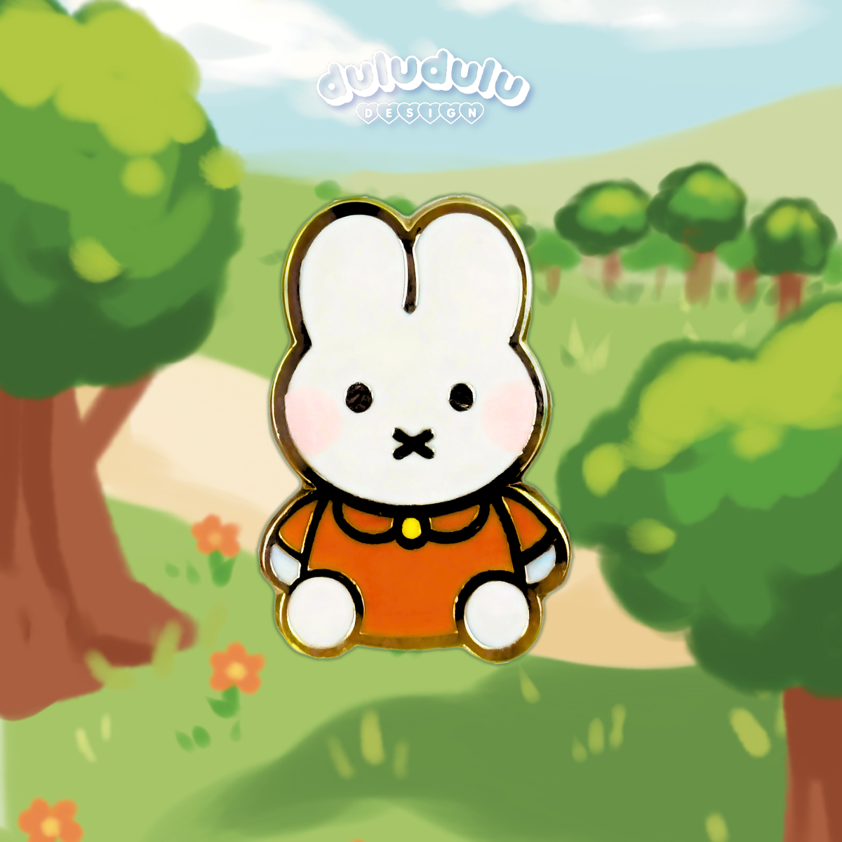 orange blue miffy pin on an illustrated background