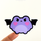 gothic frog pouting with bat wings as a vinyl sticker
