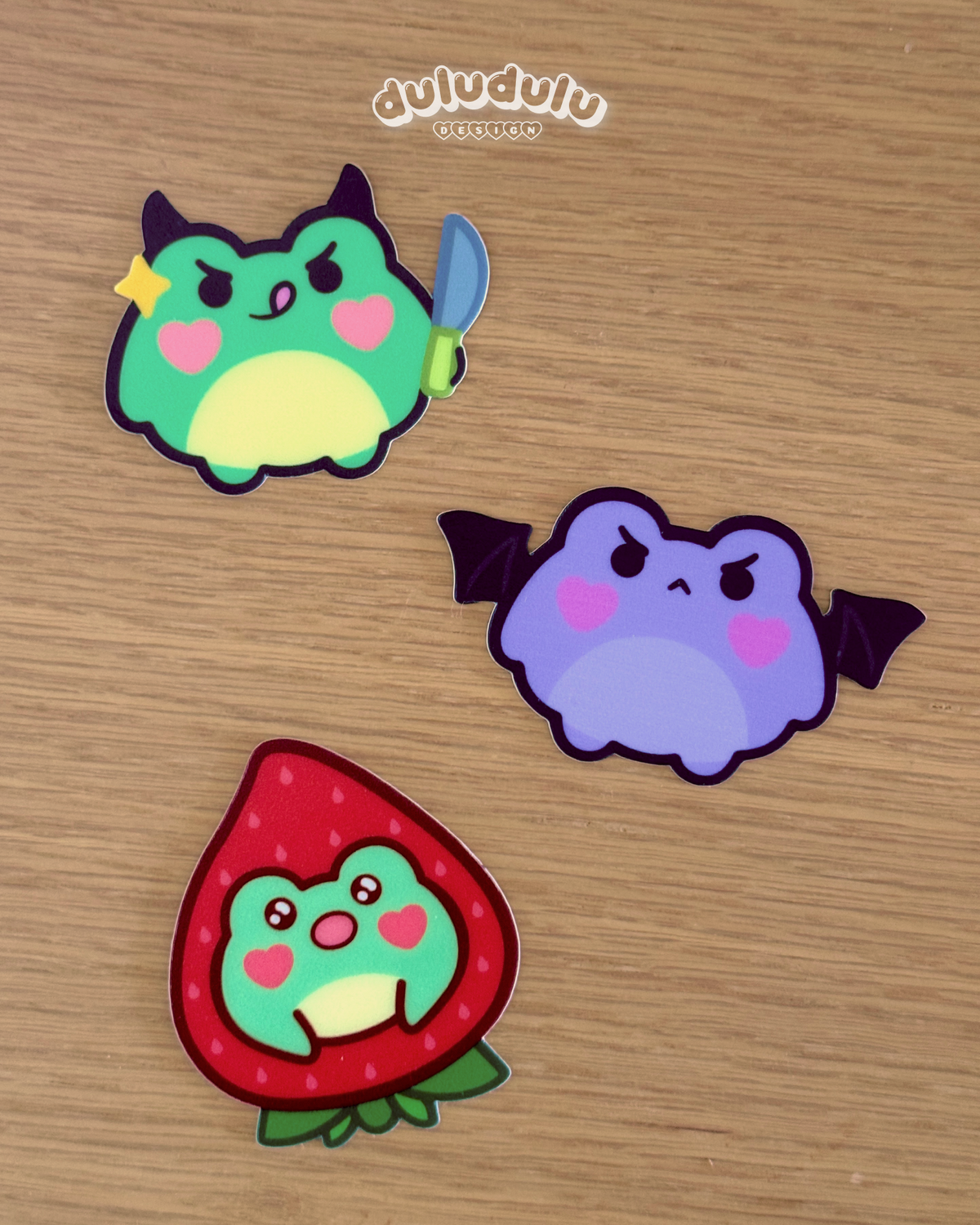 devil frog holding a knife, gothic angry frog and shocked face strawberry frog waterproof stickers