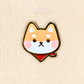 yellow shiba inu mini pin on a plain backgorund